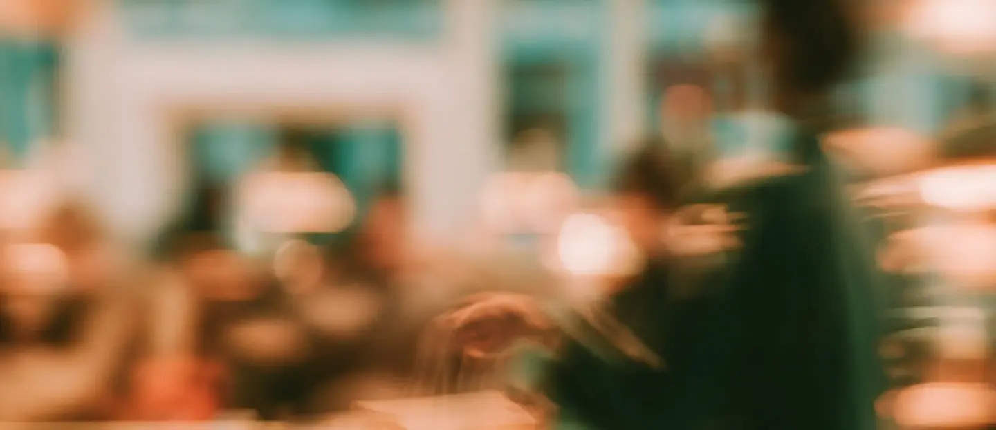 Shoppers in a busy store, in motion blur